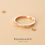 指輪 リング レディース X型 ウェーブ CZダイヤ オシャレ 上品 シンプル シルバー ゴールド フリーサイズ 金属アレルギー対応 女性 誕生日プレゼント