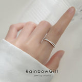 指輪 リング レディース X型 ウェーブ CZダイヤ オシャレ 上品 シンプル シルバー ゴールド フリーサイズ 金属アレルギー対応 女性 誕生日プレゼント